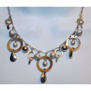 Whimsical Hoop And Charm Silver Tone Necklace